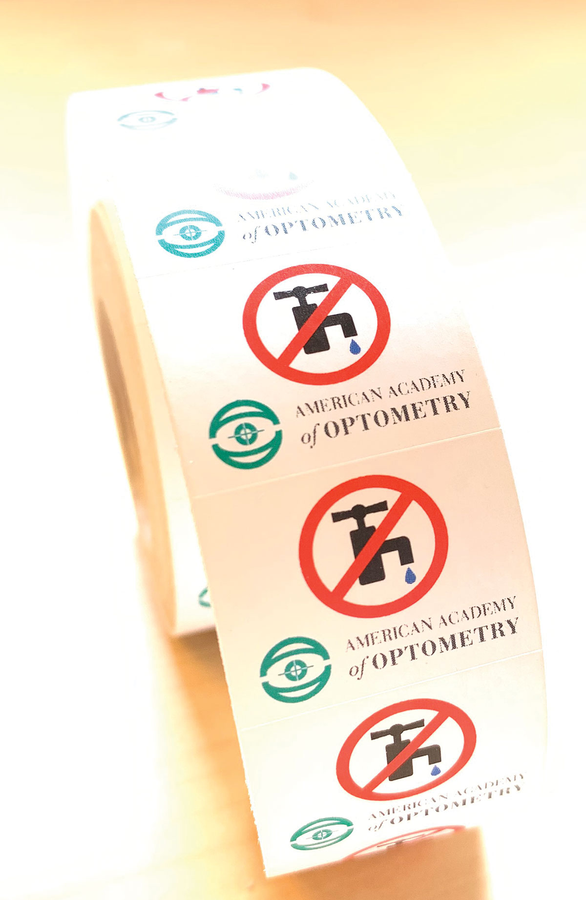 Fig. 3. These “no water” stickers, distributed by the American Academy of Optometry, can help reinforce to patients that no amount of water exposure is acceptable.