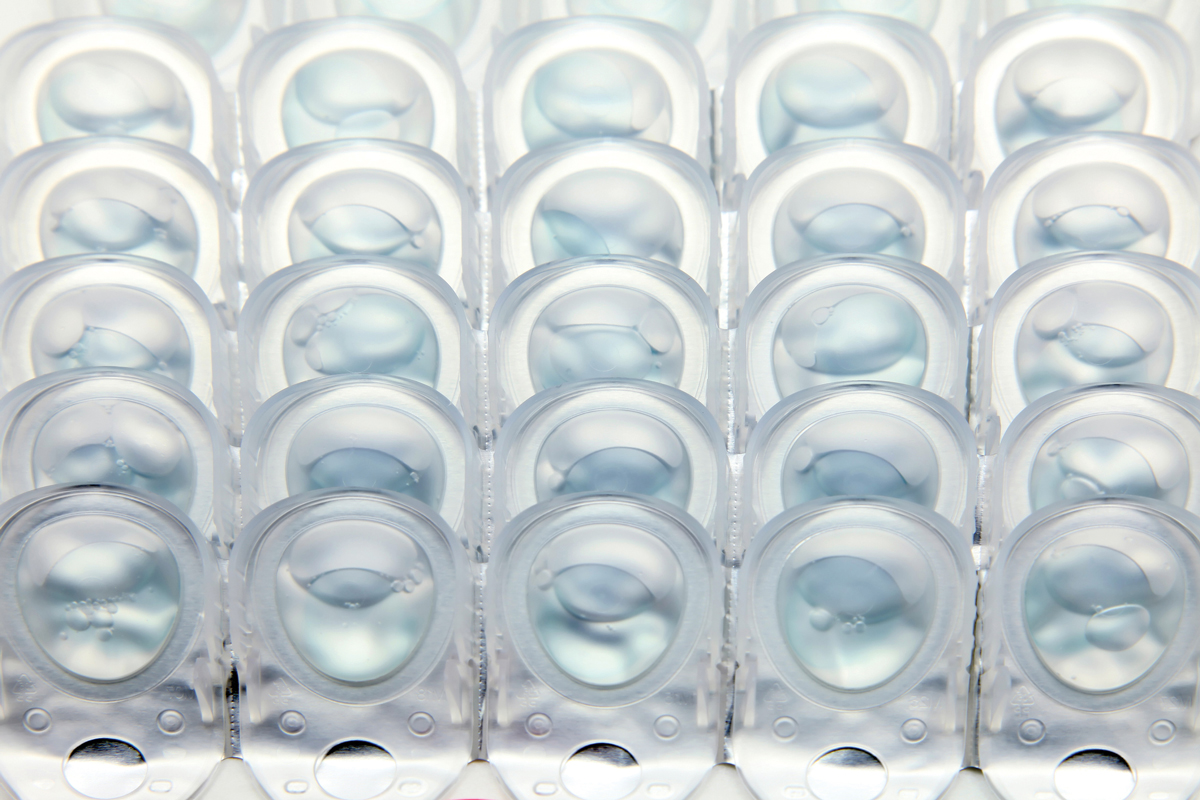 The now-ubiquitous blister pack was revolutionary upon its introduction. As a means of packaging and distributing lenses at high volume, the cost per lens was reduced from that of glass vial production lines and more elements of the manufacturing process could be automated—bringing additional cost savings as well as shortening production time.